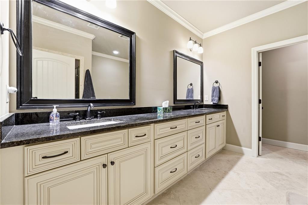 265 Trecastle Square Canton, GA 30114 - Photo 24 of 47 a bathroom with double sink and a mirror