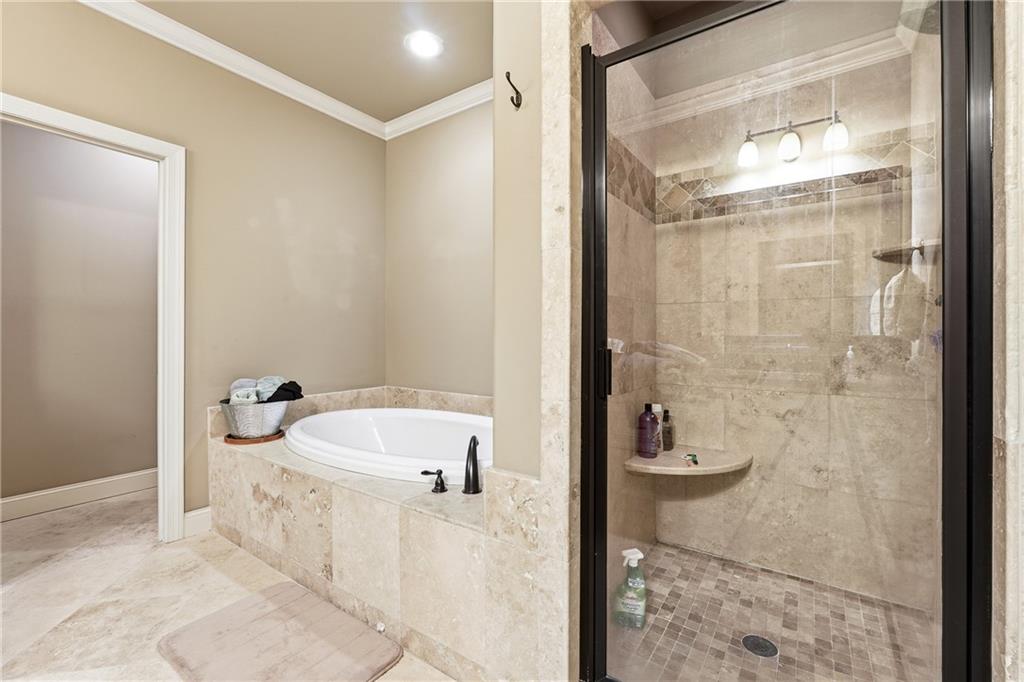 265 Trecastle Square Canton, GA 30114 - Photo 25 of 47 a bathroom with a sink and a shower