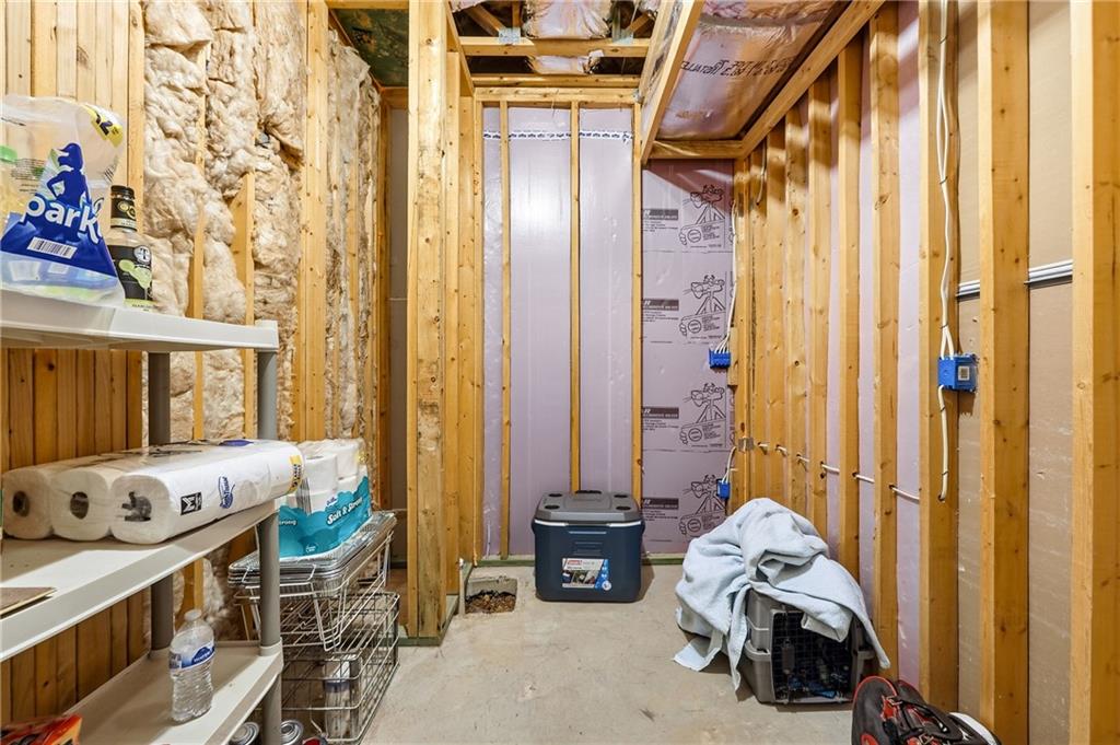 265 Trecastle Square Canton, GA 30114 - Photo 31 of 47 a bedroom with a bed and a mirror