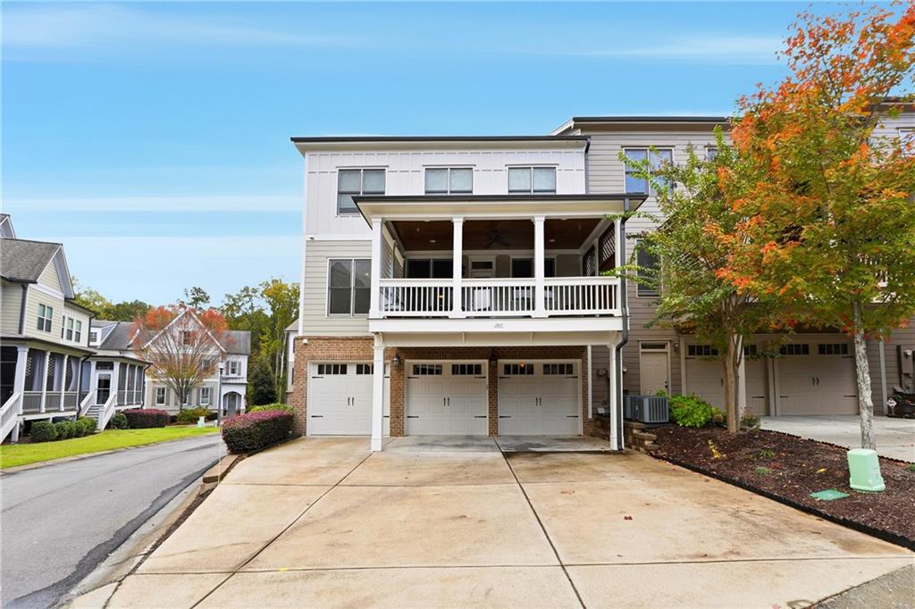 265 Trecastle Square Canton, GA 30114 - Photo 37 of 47 a view of a building with a window and a tree