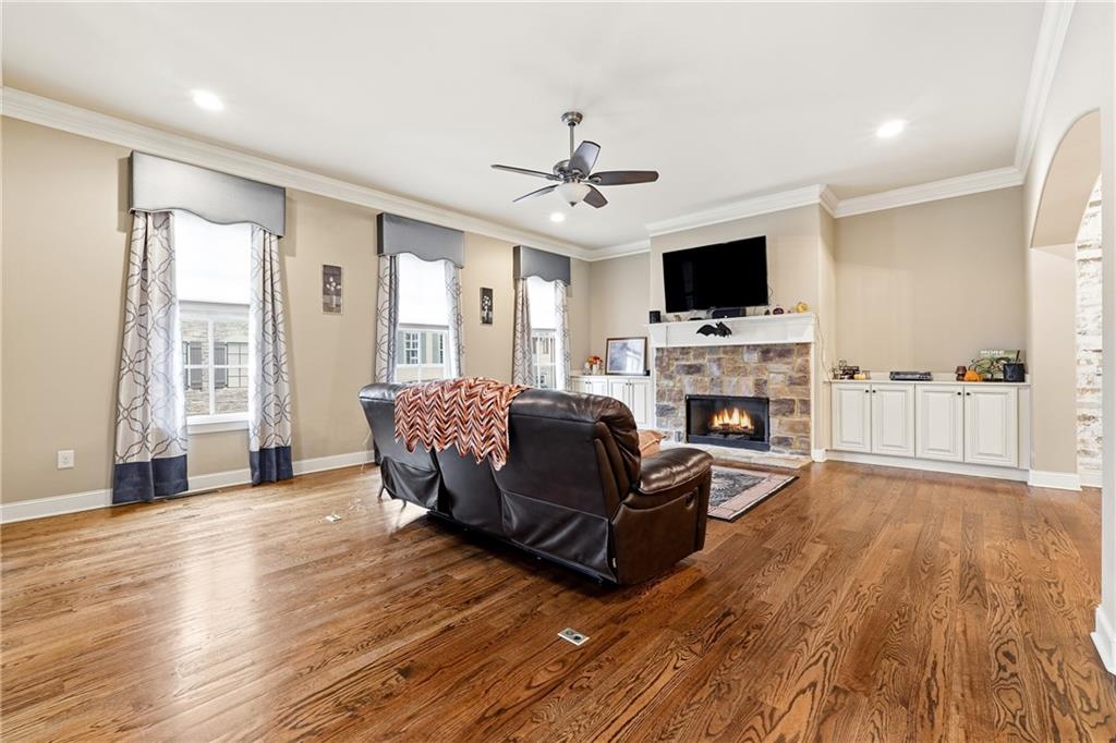 265 Trecastle Square Canton, GA 30114 - Photo 8 of 47 a living room with furniture fireplace and flat screen tv