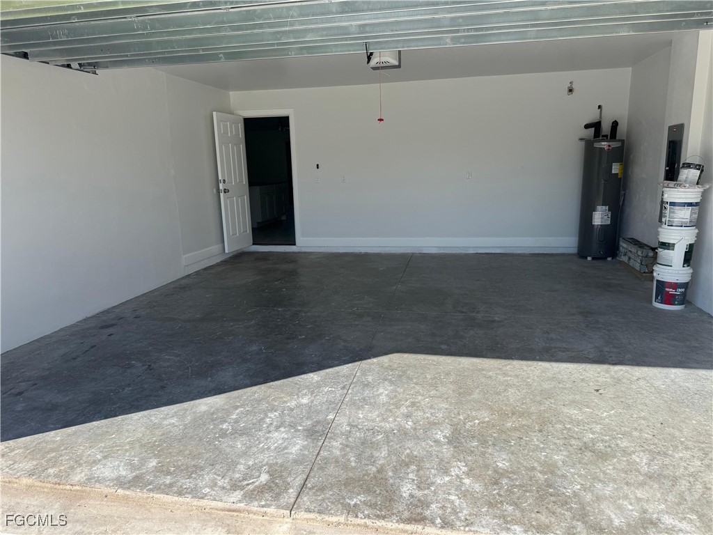 3314 36th Street Southwest Lehigh Acres, FL 33976 - Photo 22 of 23 a view of a garage