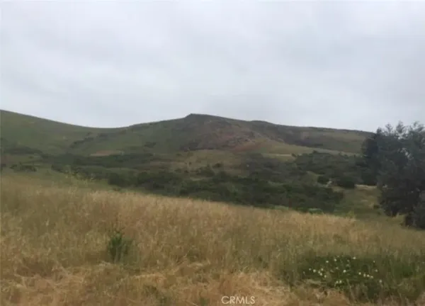 a view of a lake with mountains in the background