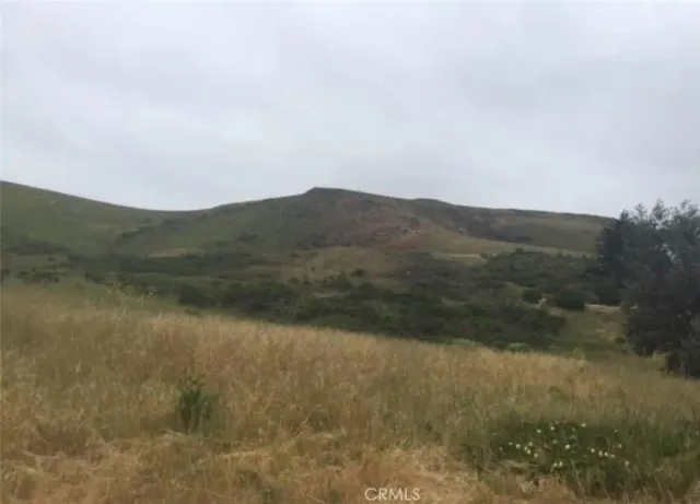 a view of a lake with mountains in the background