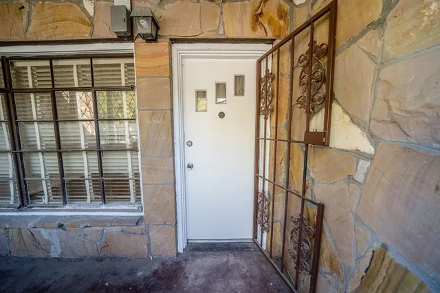 a view of a house with a small porch