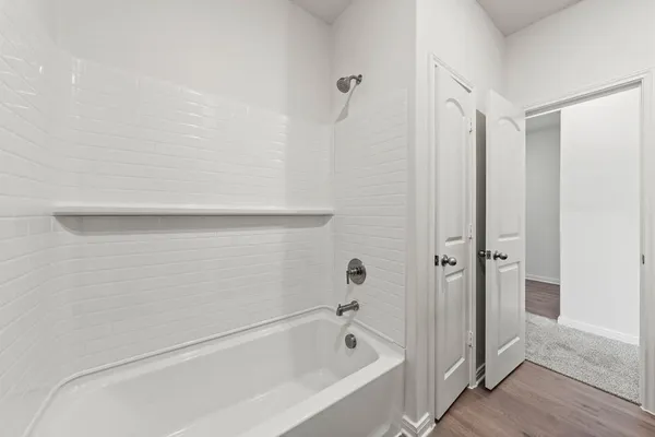 a bathroom with a bathtub