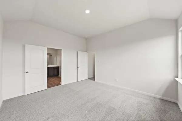 a view of an empty room and closet