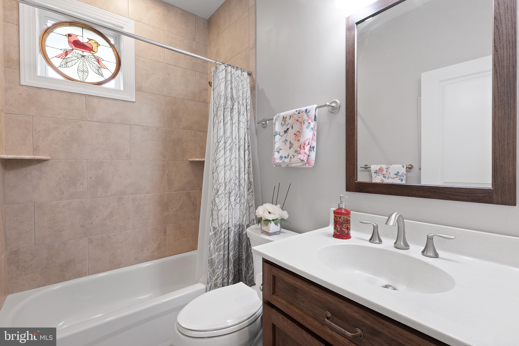60 Cooper Lane Gettysburg, PA 17325 - Photo 18 of 51 a bathroom with a sink mirror vanity and toilet