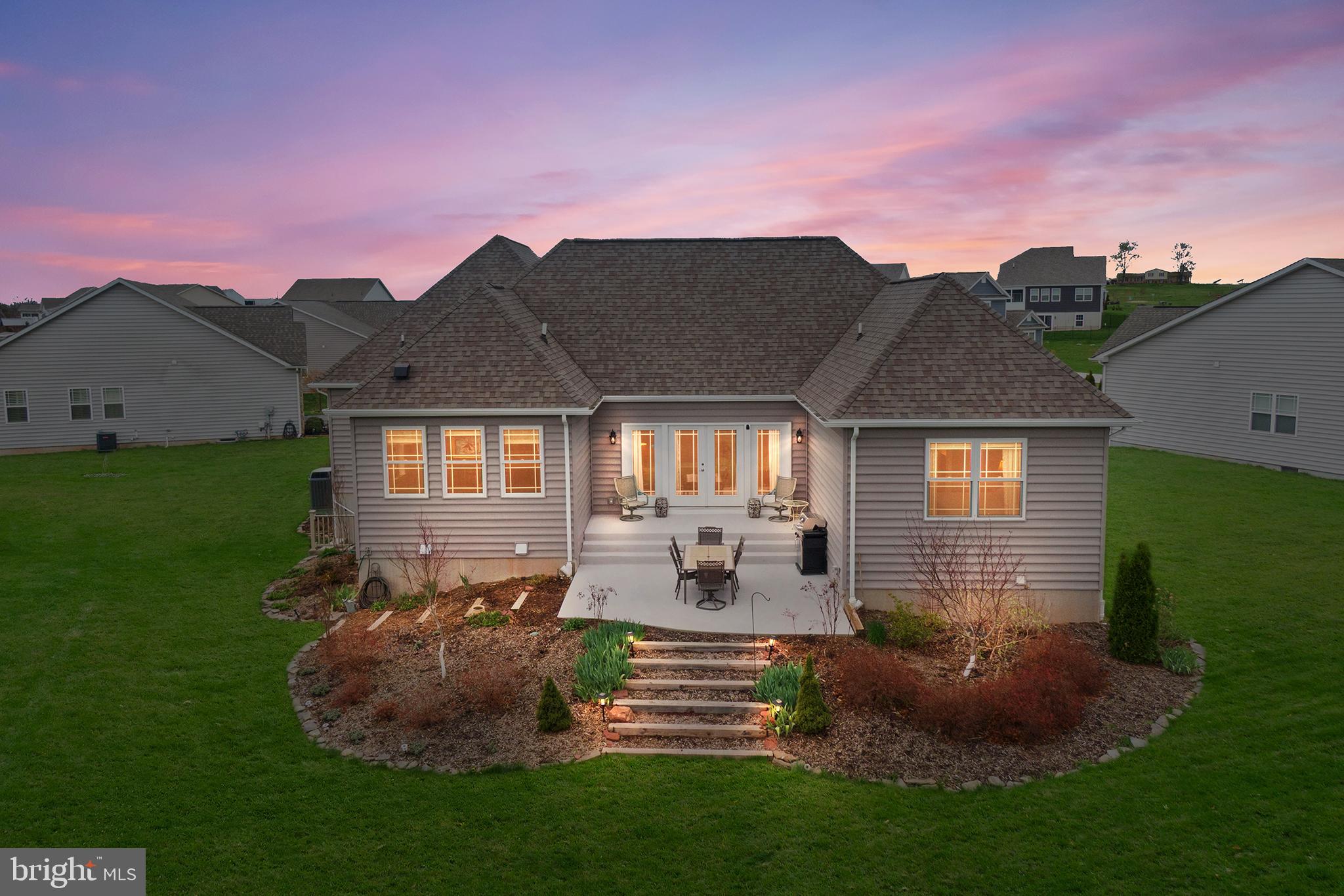 60 Cooper Lane Gettysburg, PA 17325 - Photo 2 of 51 a front view of a house with a garden and porch