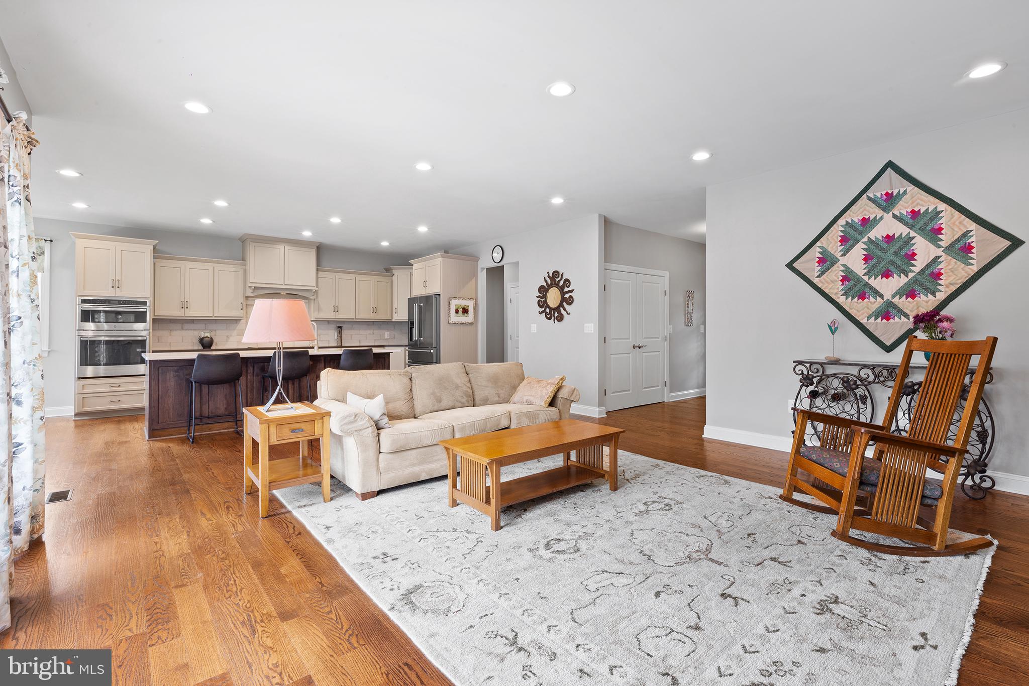 60 Cooper Lane Gettysburg, PA 17325 - Photo 10 of 51 a living room with furniture and a dining table with wooden floor