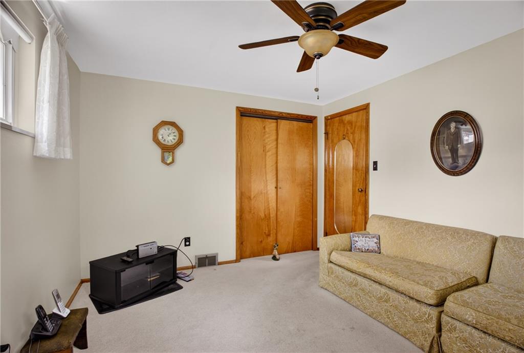 186 William Street McKees Rocks, PA 15136 - Photo 23 of 45 a bedroom with a bed and a chandelier