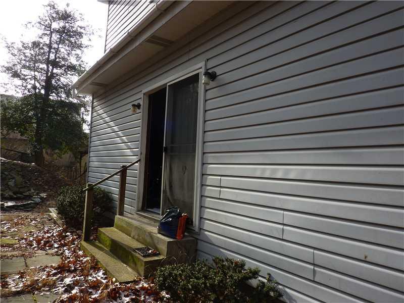 1054 Lapish Road Brighton Heights, PA 15212 - Photo 11 of 14 Exterior Back. DOORS LEADING FROM BEDRM OR MULTI-PURPOSE ROOM