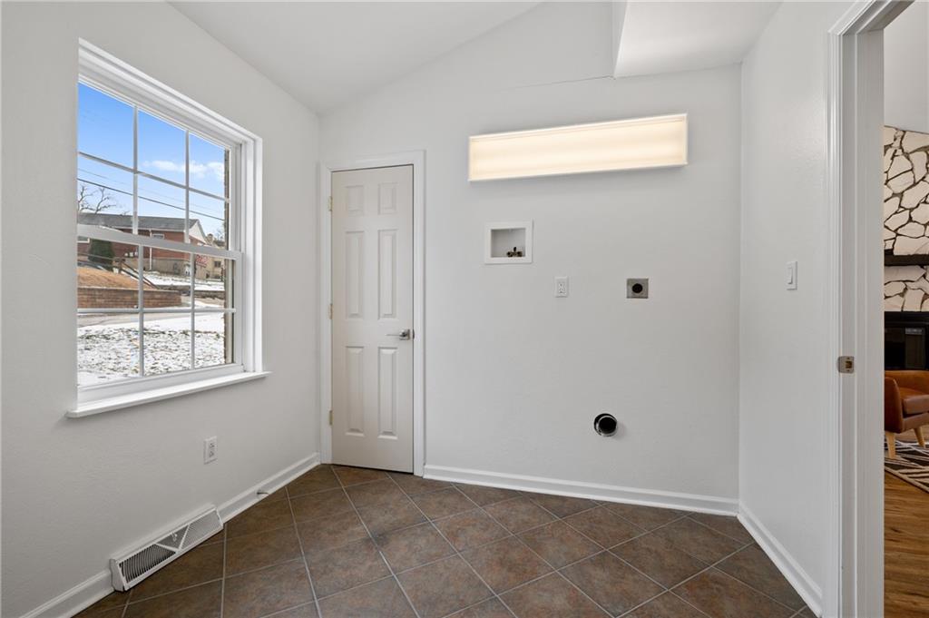 200 Pinchtown Road Pittsburgh, PA 15236 - Photo 11 of 26 a view of an empty room with a window