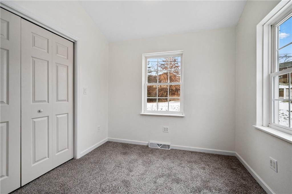 200 Pinchtown Road Pittsburgh, PA 15236 - Photo 12 of 26 an empty room with windows