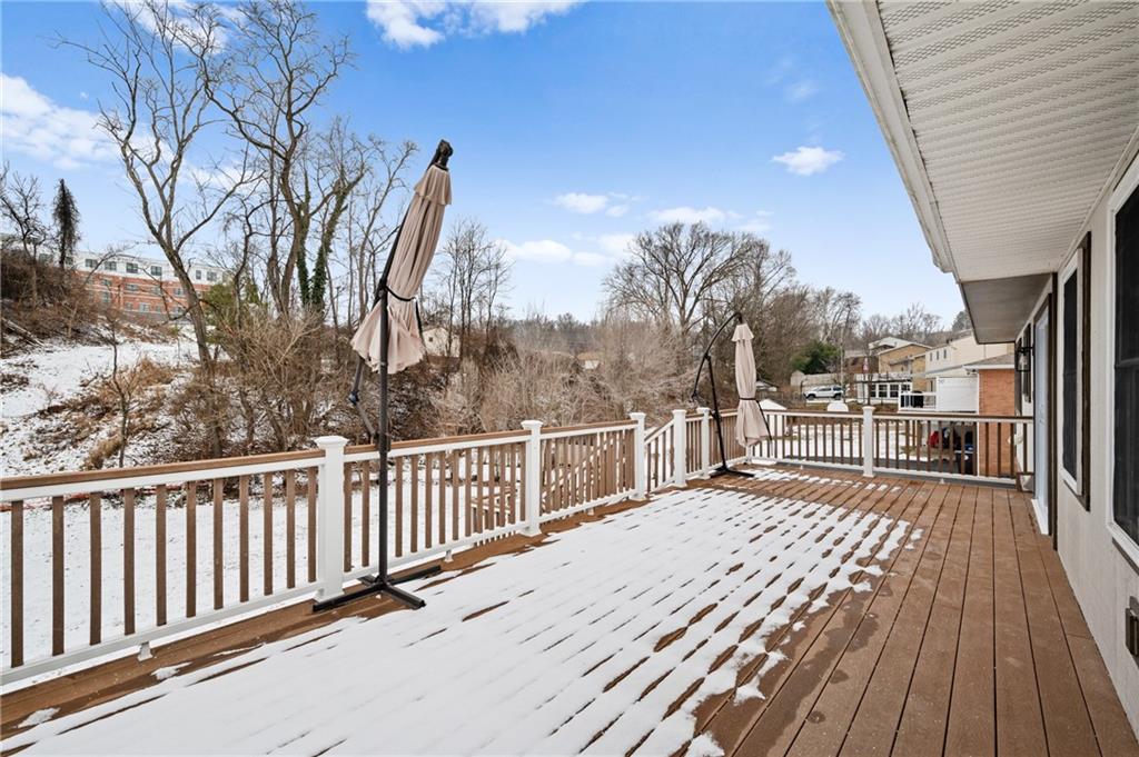 200 Pinchtown Road Pittsburgh, PA 15236 - Photo 24 of 26 a view of a terrace with wooden floor and fence