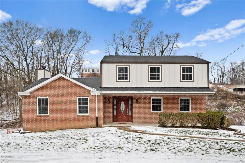 200 Pinchtown Road Pittsburgh, PA 15236 - Photo 26 of 26 a front view of a house with a yard