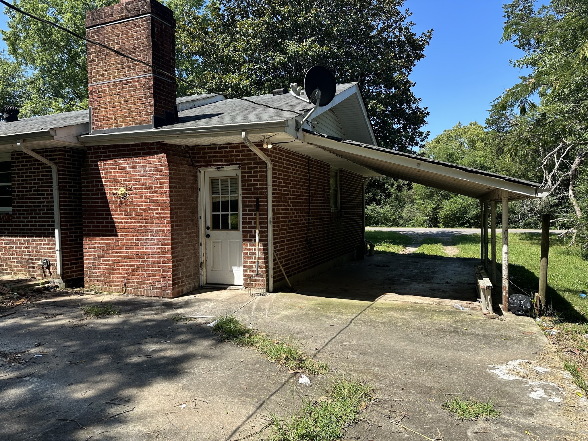 10026 Mona Road Murfreesboro, TN 37129 - Photo 35 of 64 a front view of a house with a yard