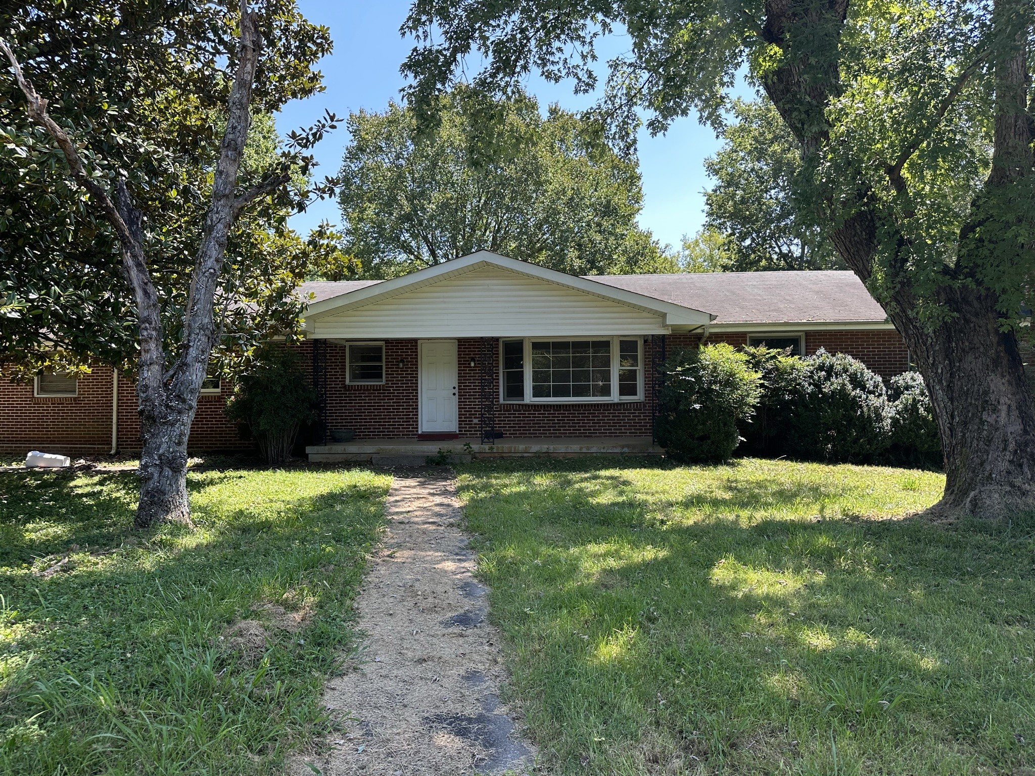 10026 Mona Road Murfreesboro, TN 37129 - Photo 41 of 64 a view of a house with a yard