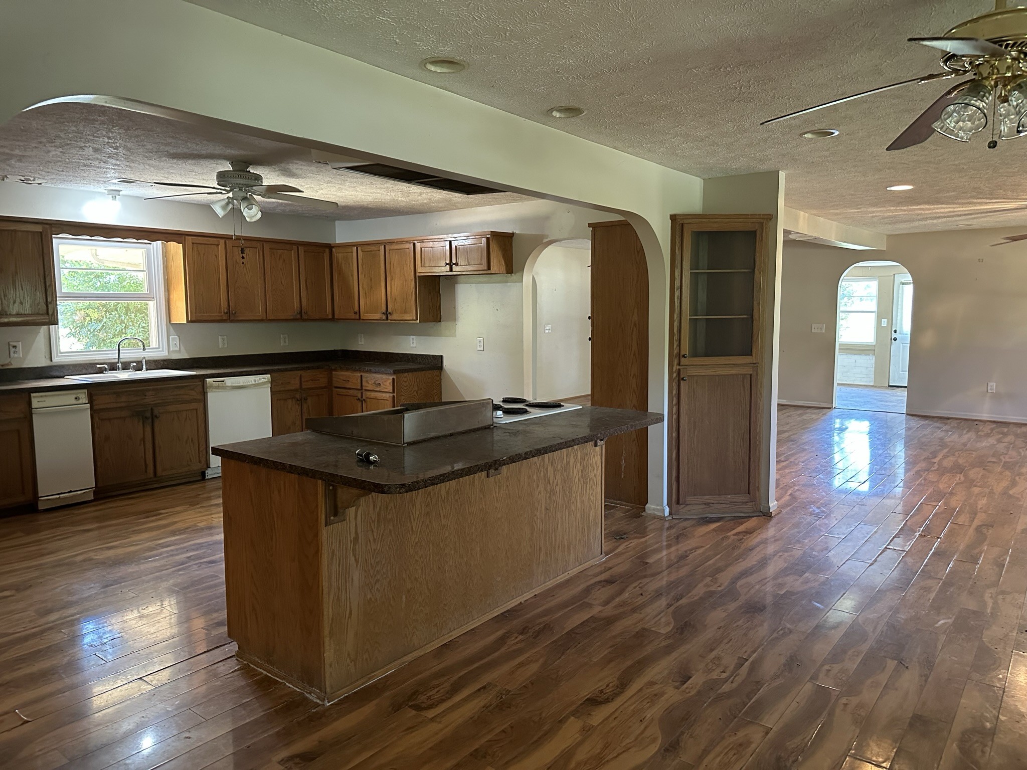 10026 Mona Road Murfreesboro, TN 37129 - Photo 44 of 64 a kitchen with stainless steel appliances granite countertop a stove and a sink