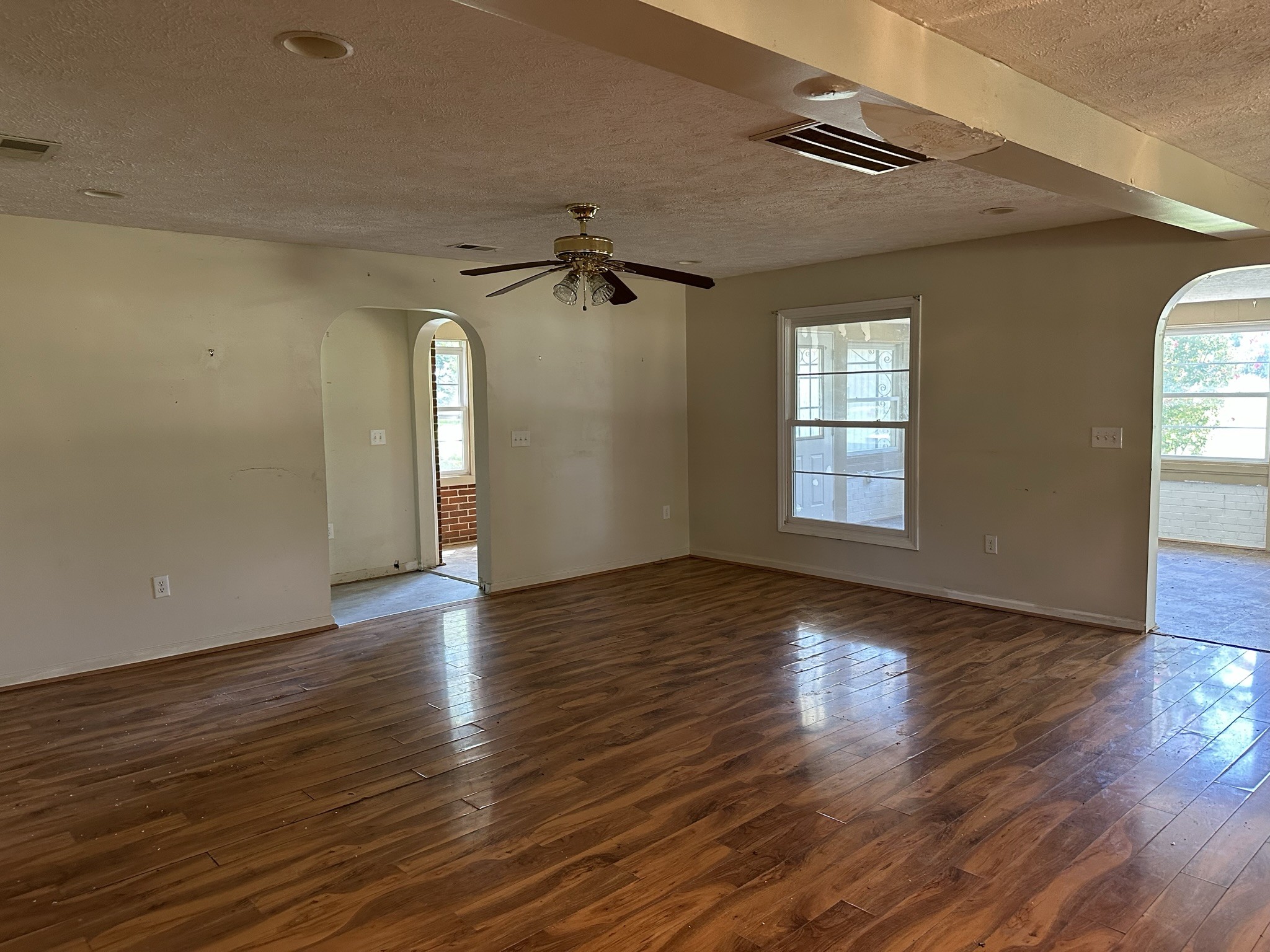 10026 Mona Road Murfreesboro, TN 37129 - Photo 48 of 64 an empty room with wooden floor and windows