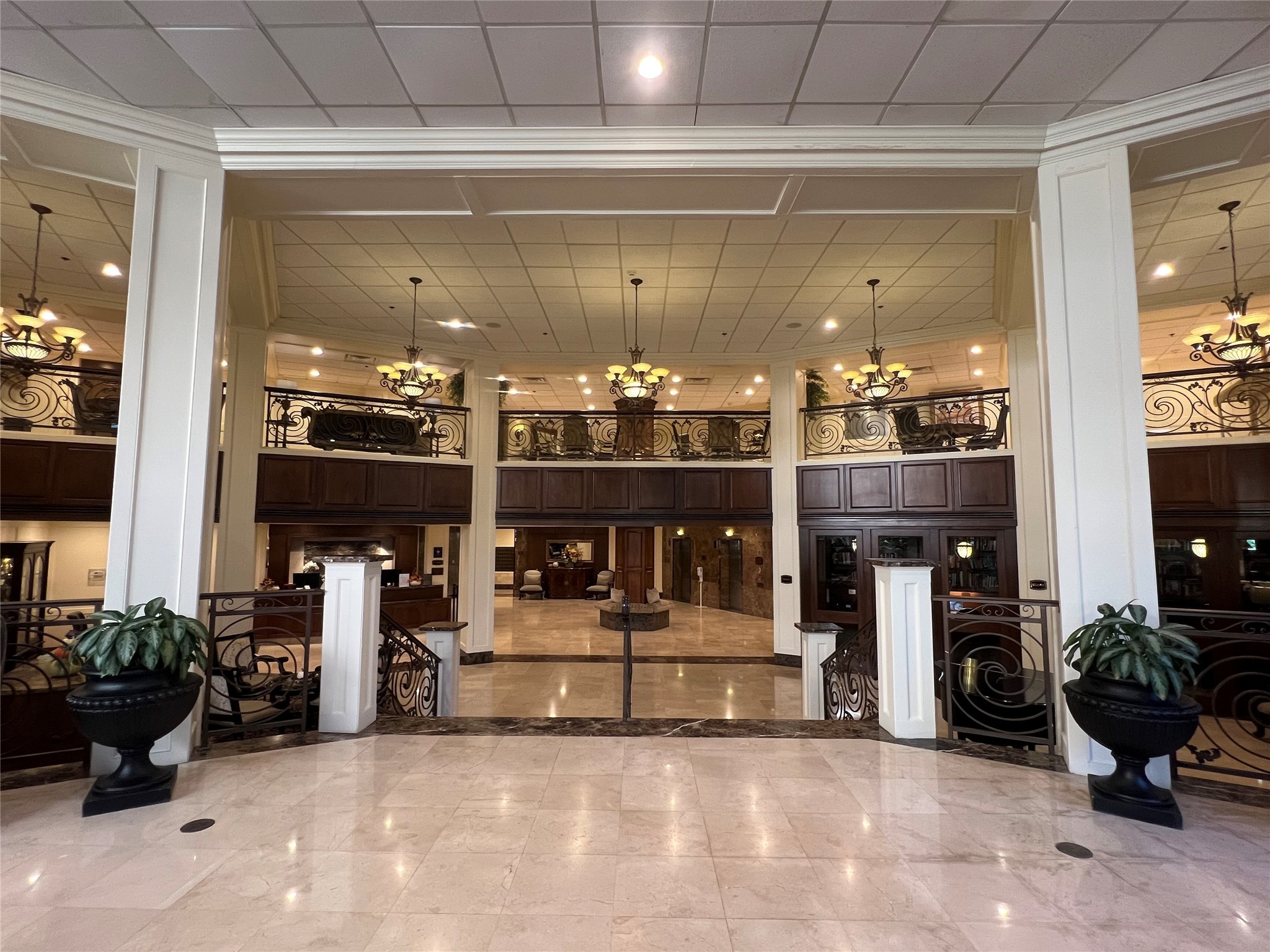 3525 Sage Road, Unit 1218 Houston, TX 77056 - Photo 12 of 18 a room with lots of potted plants