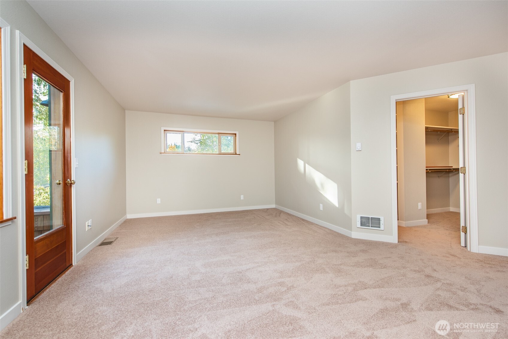 62 Pierson Lane Sequim, WA 98382 - Photo 24 of 40 an empty room with windows and closet