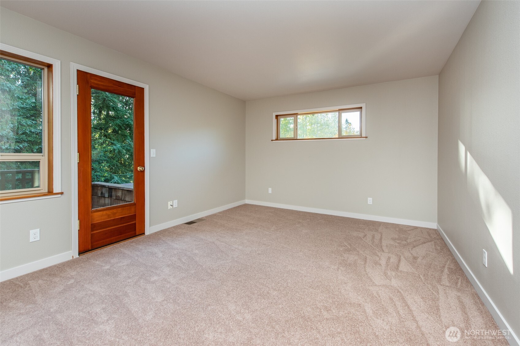 62 Pierson Lane Sequim, WA 98382 - Photo 25 of 40 an empty room with windows