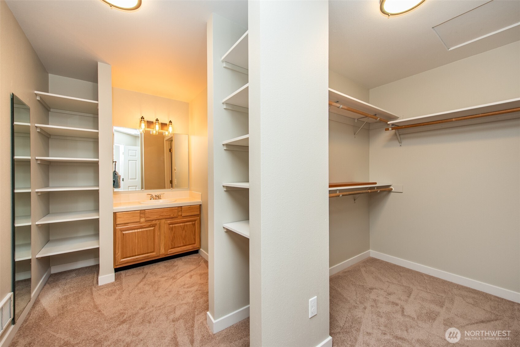 62 Pierson Lane Sequim, WA 98382 - Photo 26 of 40 a view of walk in closet with empty racks