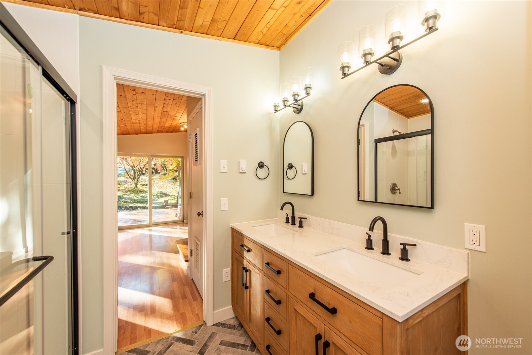 62 Pierson Lane Sequim, WA 98382 - Photo 32 of 40 a bathroom with a double vanity sink mirror and