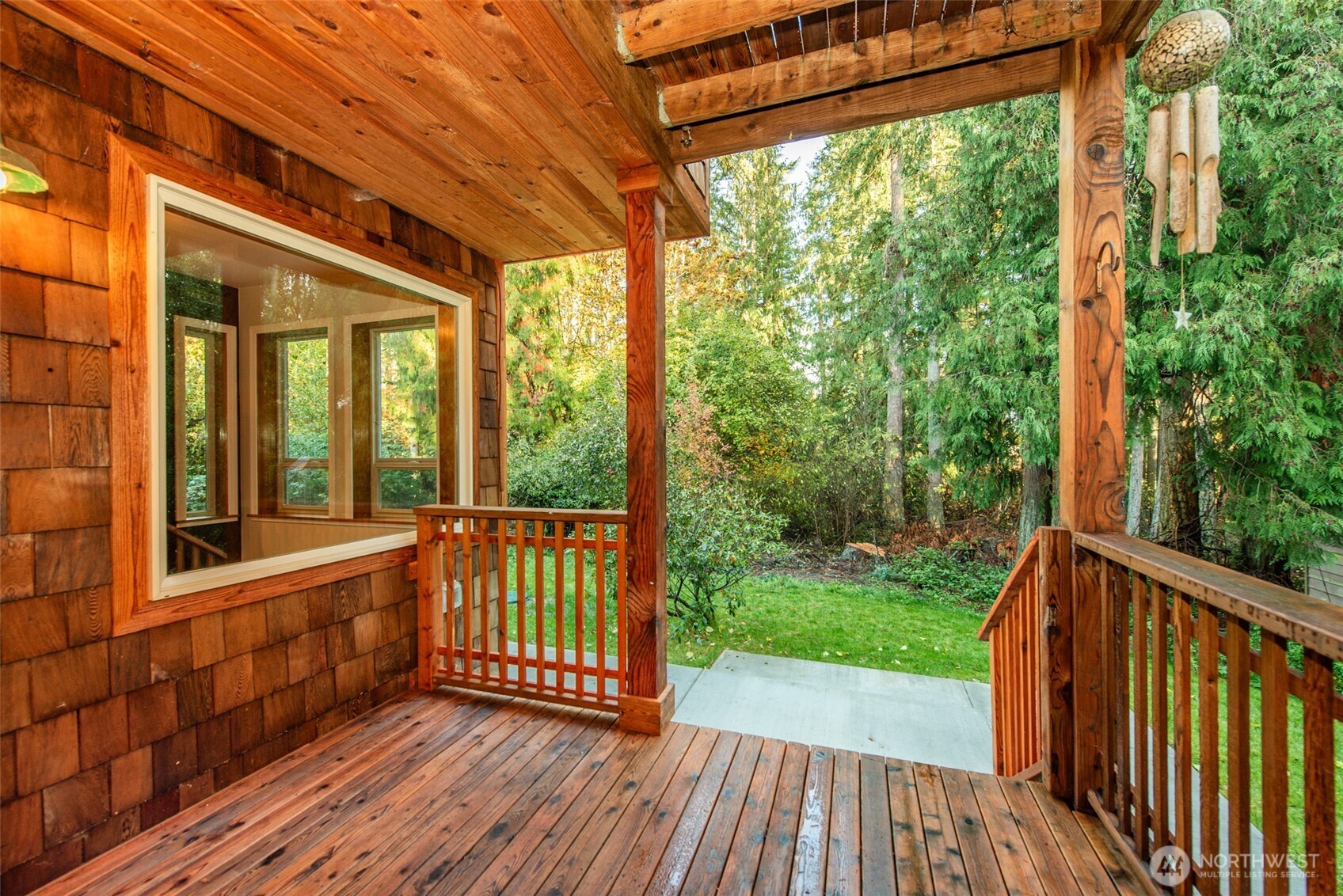 62 Pierson Lane Sequim, WA 98382 - Photo 35 of 40 a view of a porch with wooden floor