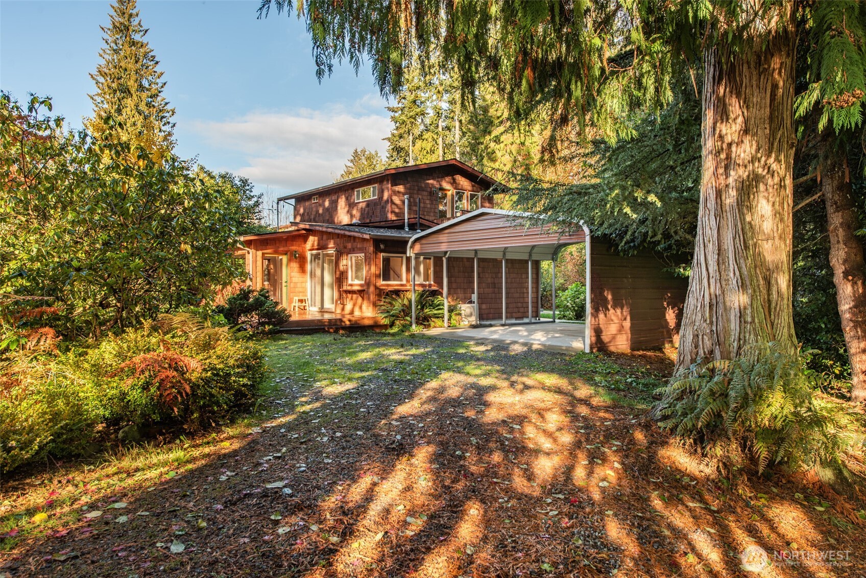 62 Pierson Lane Sequim, WA 98382 - Photo 37 of 40 a front view of a house with a yard