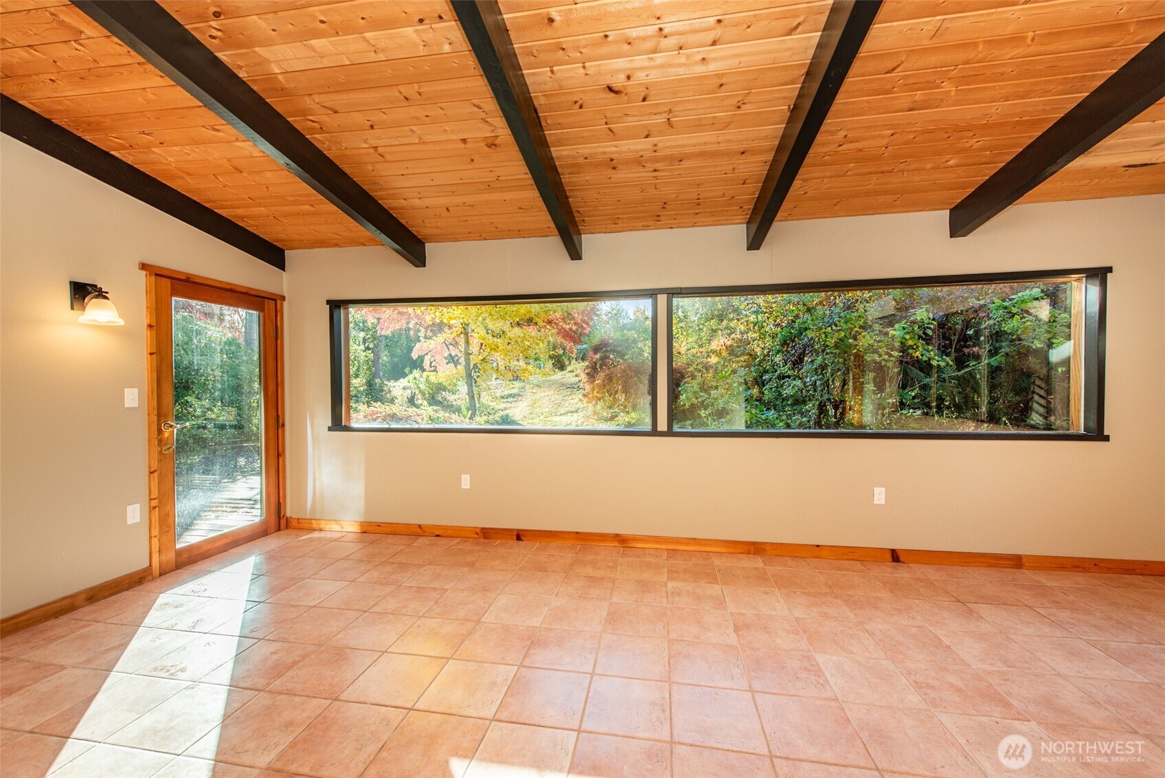 62 Pierson Lane Sequim, WA 98382 - Photo 6 of 40 a view of an empty room with a window