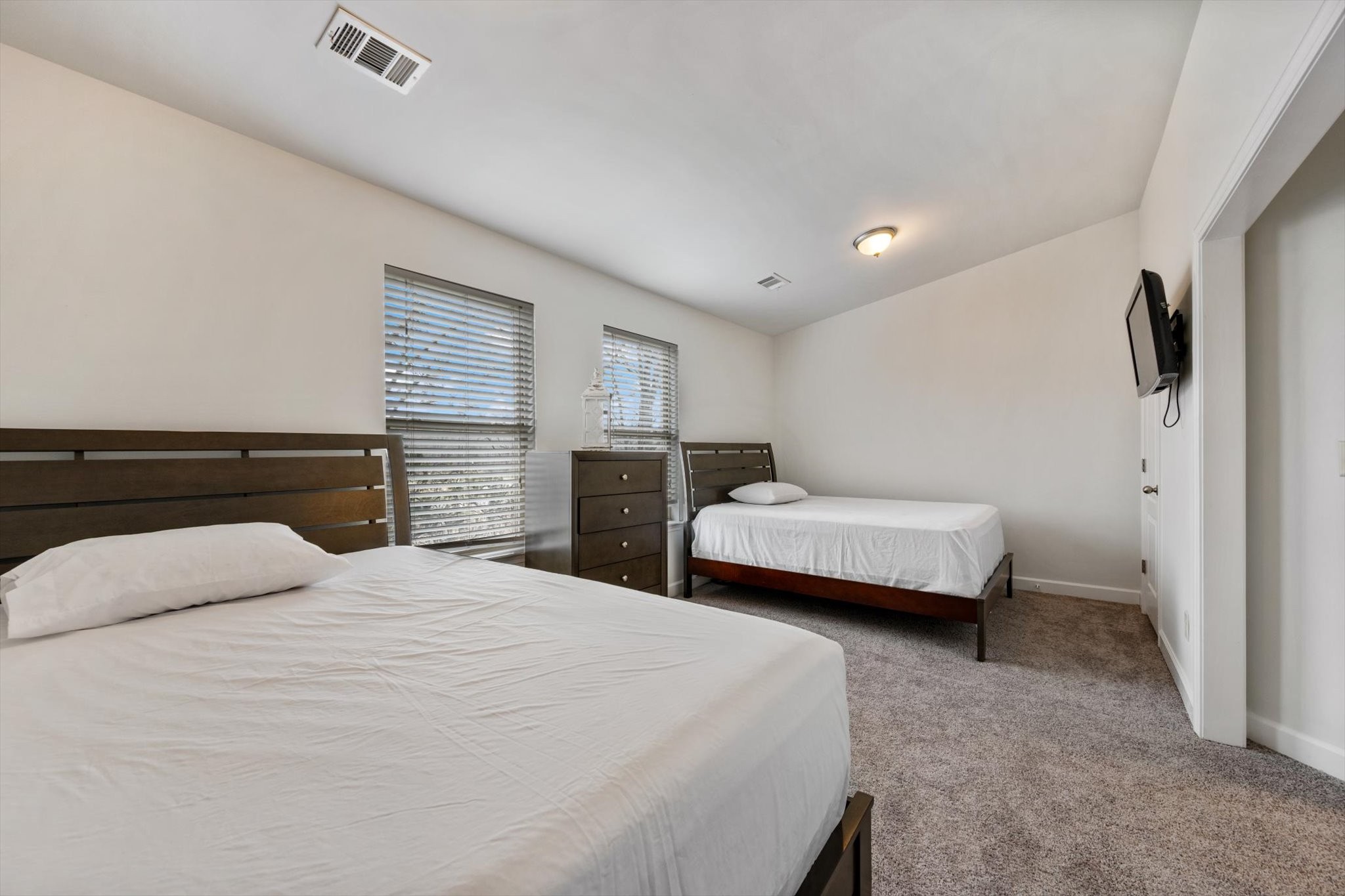 735 Tulip Grove Road, Unit 311 Hermitage, TN 37076 - Photo 17 of 23 a bedroom with a bed and a couch