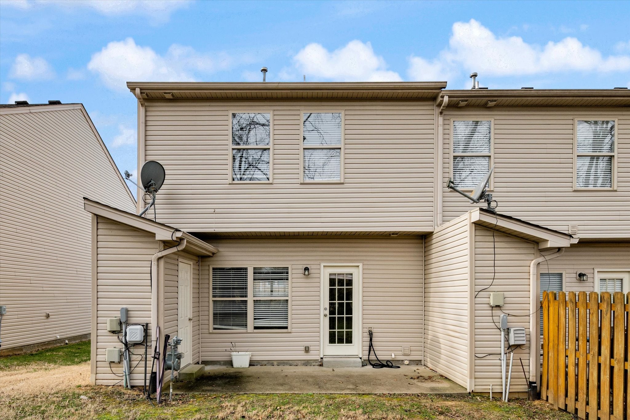 735 Tulip Grove Road, Unit 311 Hermitage, TN 37076 - Photo 21 of 23 a front view of a house with garage