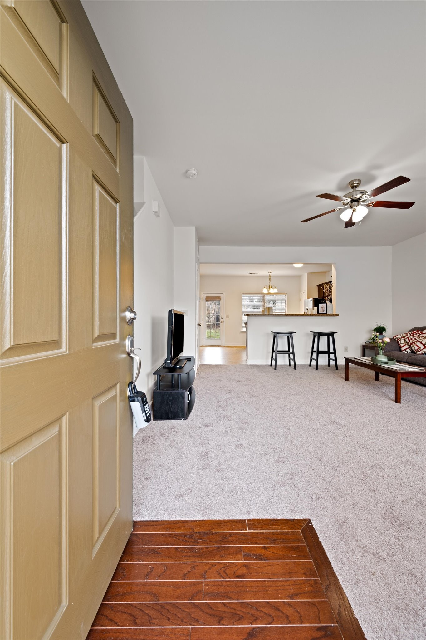 735 Tulip Grove Road, Unit 311 Hermitage, TN 37076 - Photo 3 of 23 a living room with furniture and a wooden floor