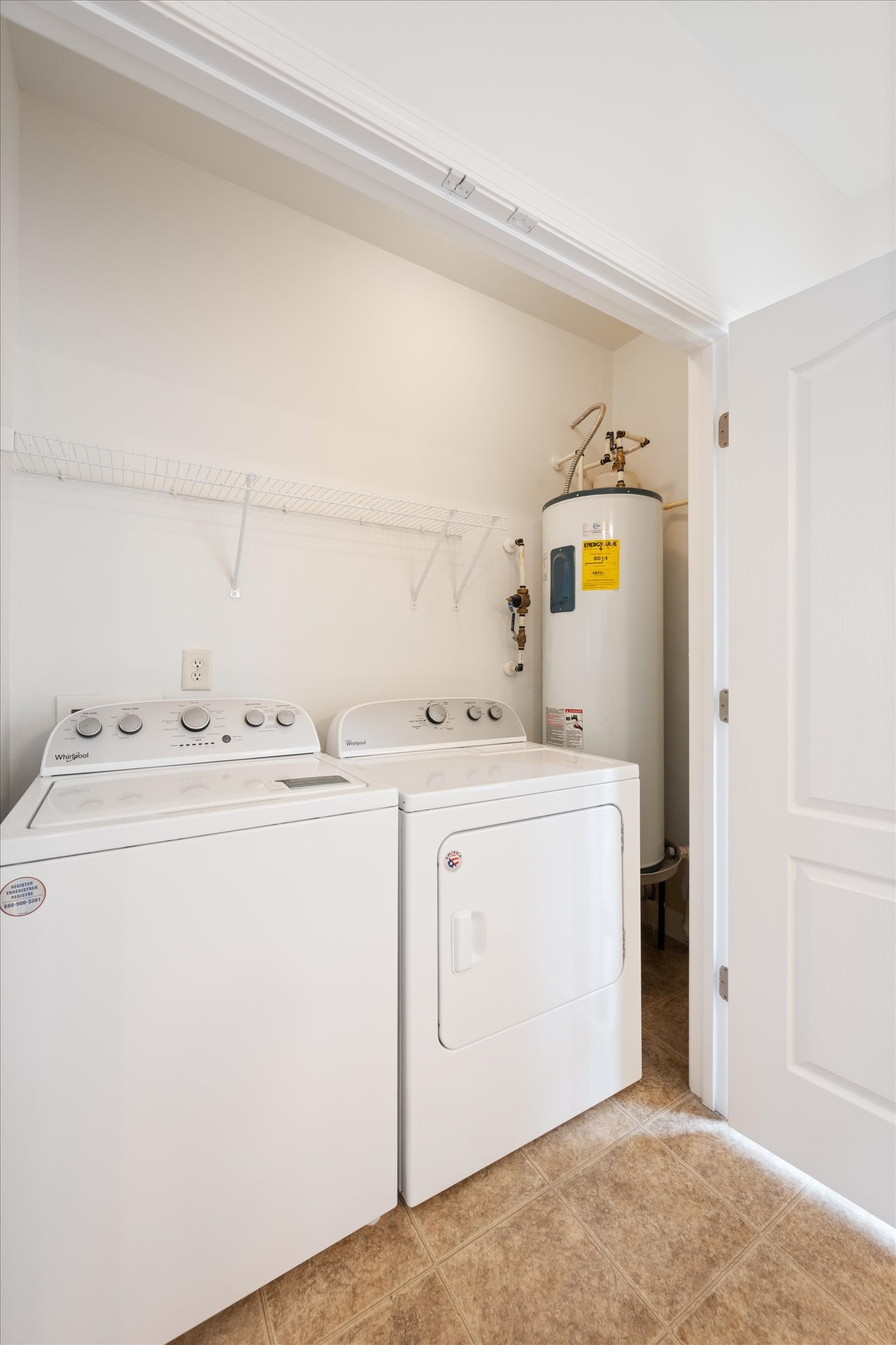 735 Tulip Grove Road, Unit 311 Hermitage, TN 37076 - Photo 9 of 23 a utility room with dryer and washer
