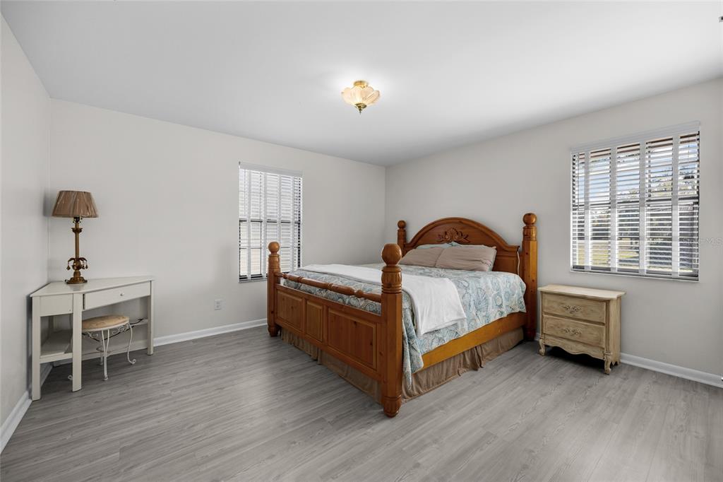 3012 Southeast Country Club Road Lake City, FL 32025 - Photo 23 of 41 a bedroom with a bed and a window