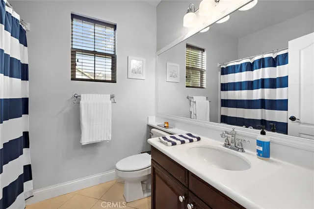 an aerial view of a house swimming pool and outdoor seating