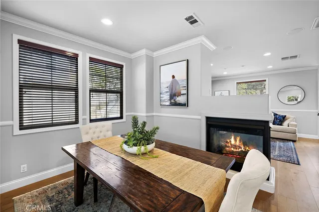 a kitchen with a table and chairs in it