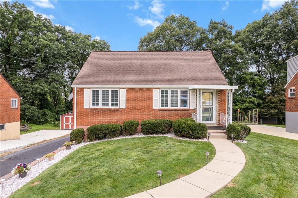 239 Roberts Road Pittsburgh, PA 15239 - Photo 1 of 30 a view of a house with a yard