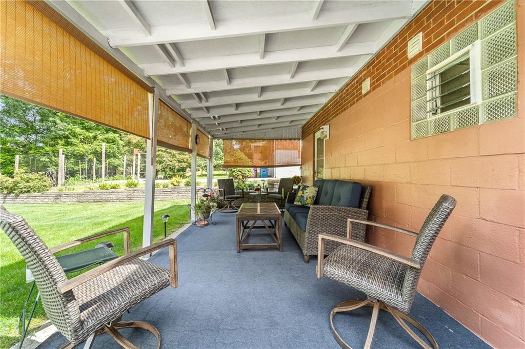 239 Roberts Road Pittsburgh, PA 15239 - Photo 24 of 30 a balcony with chairs