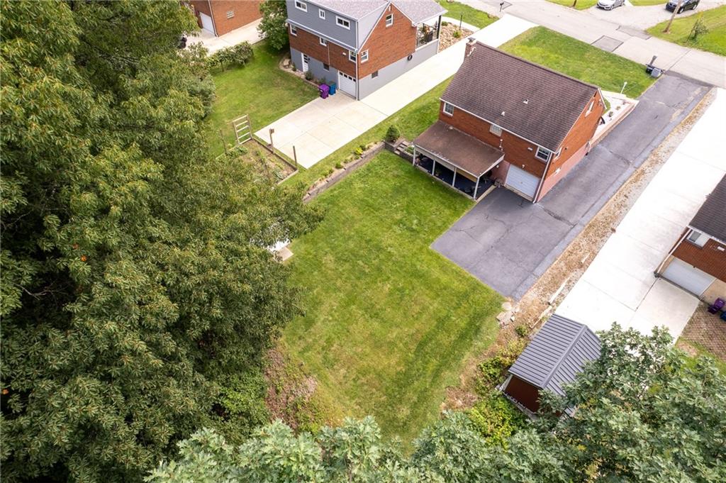 239 Roberts Road Pittsburgh, PA 15239 - Photo 27 of 30 an aerial view of a house with a garden