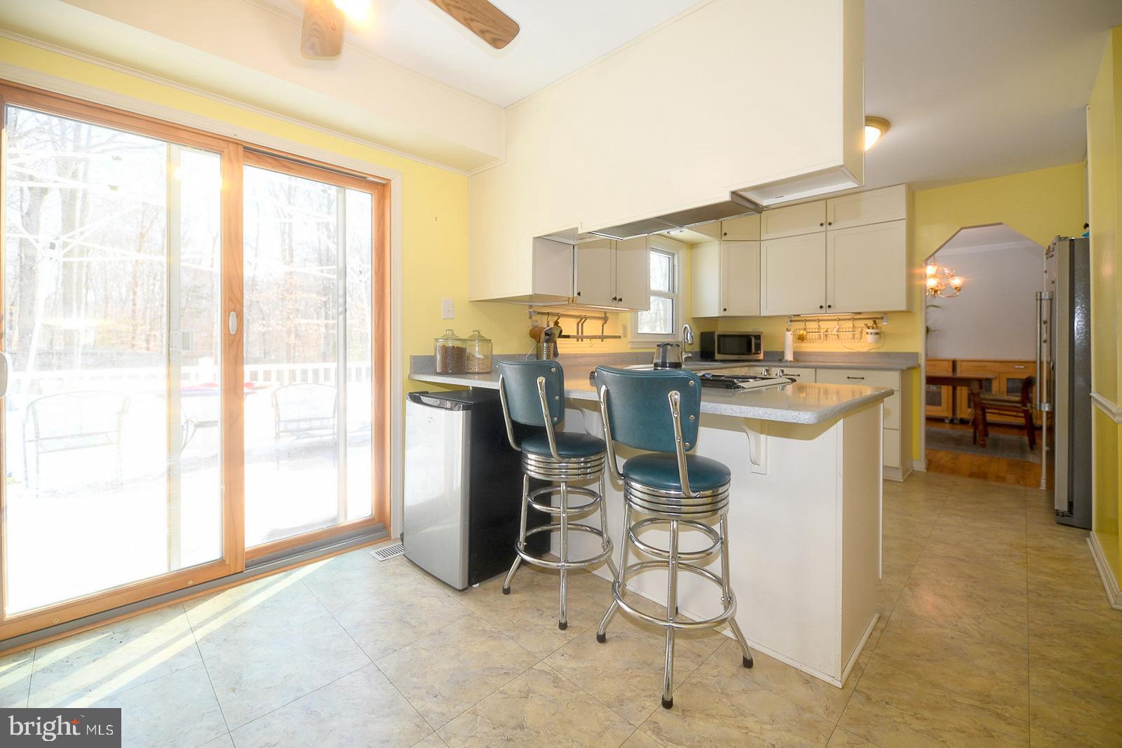 8555 Ridge Court Waldorf, MD 20603 - Photo 13 of 39 Bright and airy kitchen with outdoor views.