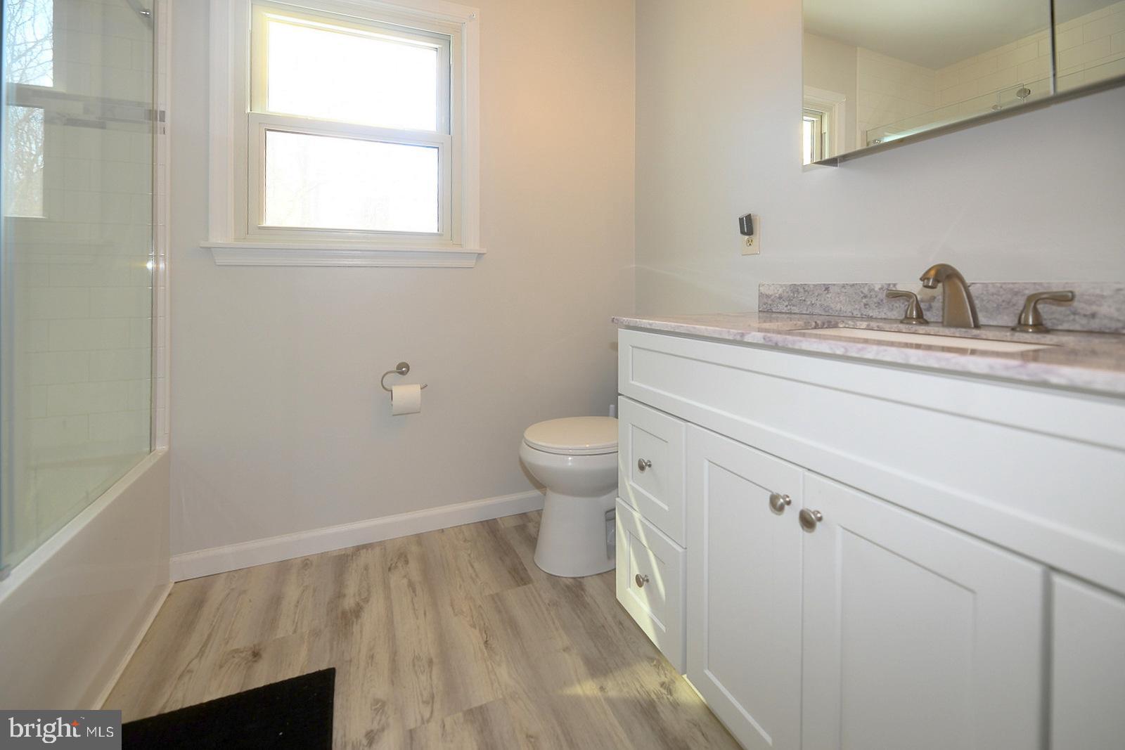 8555 Ridge Court Waldorf, MD 20603 - Photo 19 of 39 Bright and airy modern bathroom retreat.