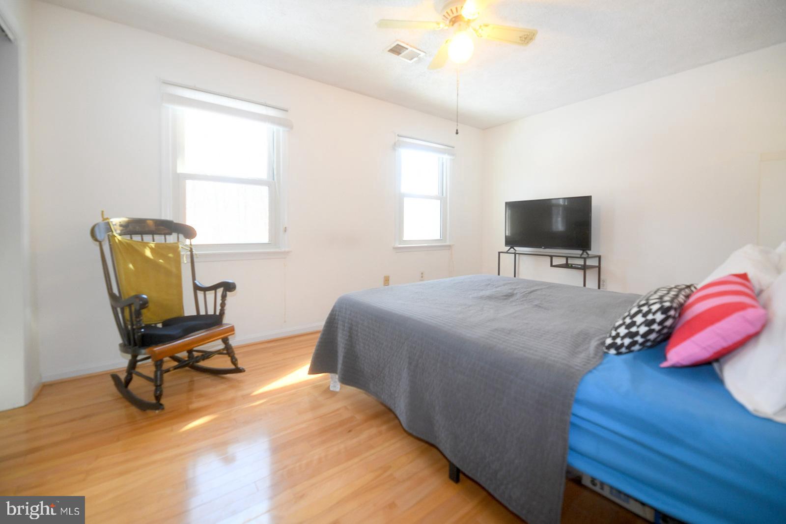 8555 Ridge Court Waldorf, MD 20603 - Photo 28 of 39 Bright and airy bedroom with cozy charm.