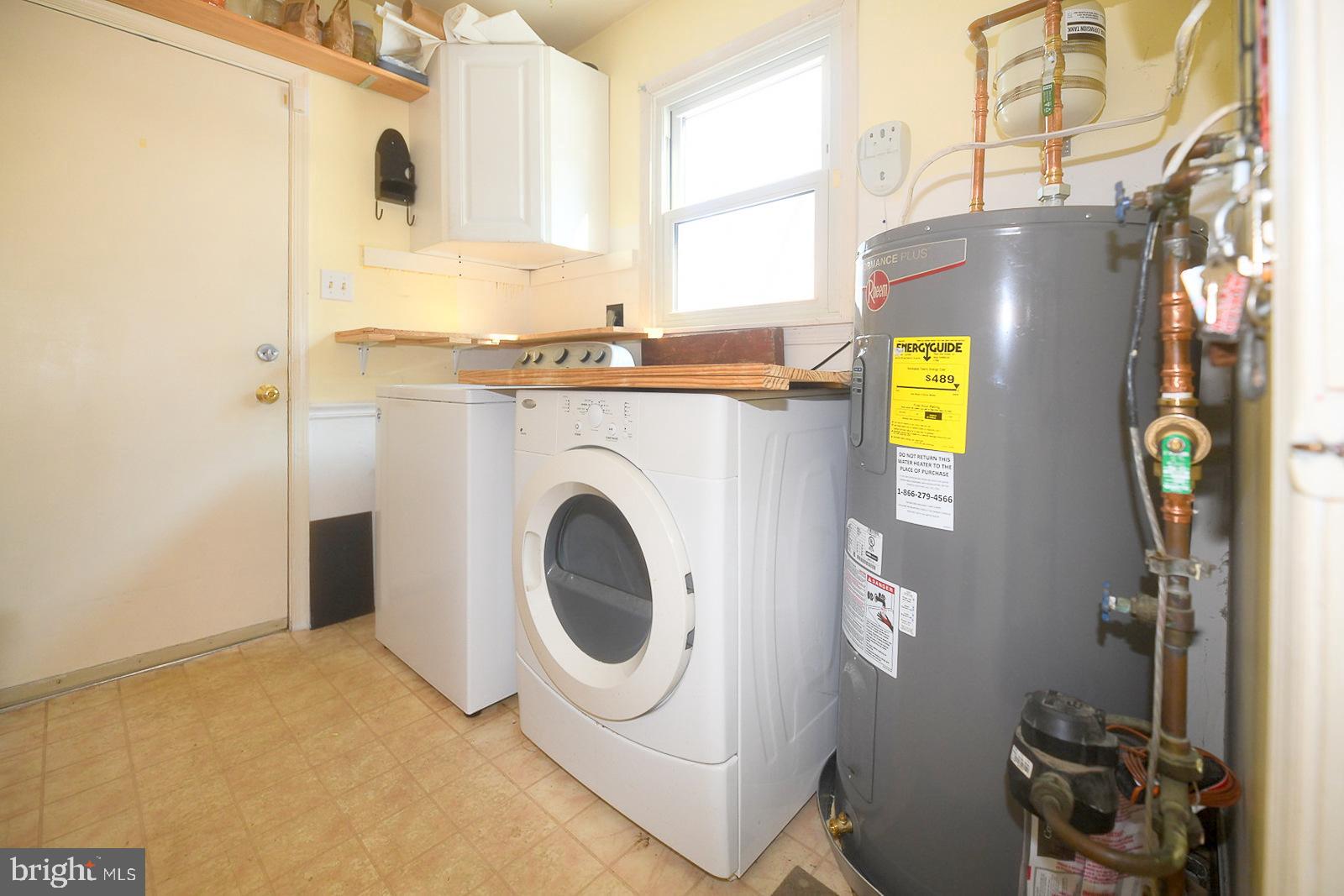 8555 Ridge Court Waldorf, MD 20603 - Photo 30 of 39 Bright and functional laundry space.