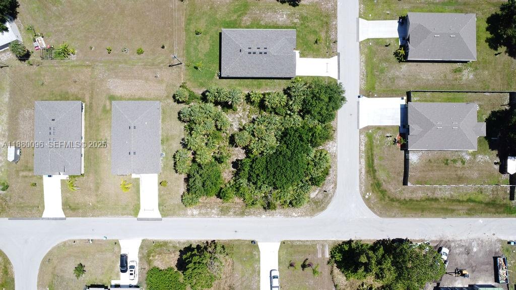 0 Th Palm Bay, FL 32908 - Photo 6 of 6 an aerial view of a house with a garden