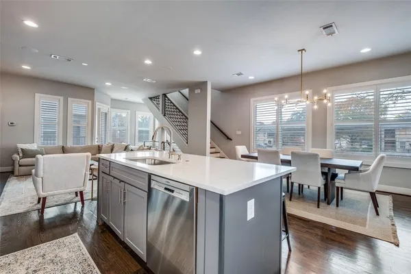 a very nice looking dining room with a large window
