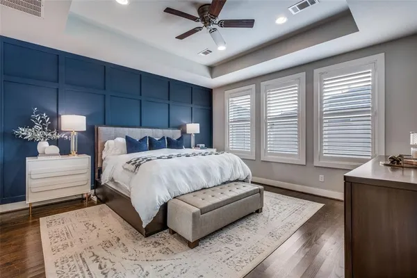 a bedroom with bed and window