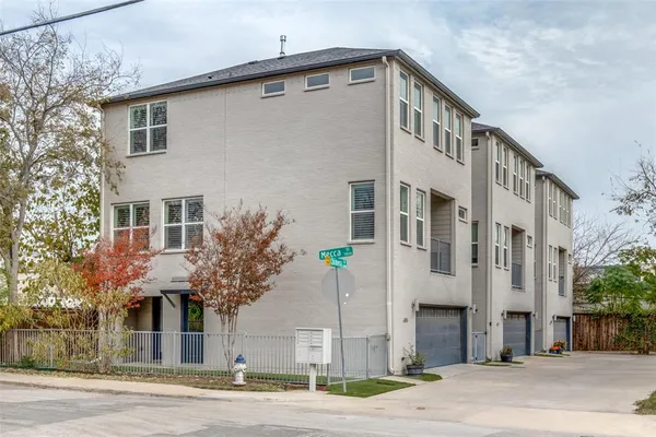 a front view of a building with a street